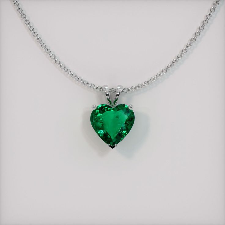 The pendant is entirely set in 18K white gold. The pendant features a beautiful, transparent 1.98 carat heart shape green emerald with the dimensions of 8.97 x 9.23 x 4.36 mm and a mixed brilliant cut. It has a clarity grade of slightly included (evaluated at eye level), vivid color saturation, and an excellent polish. The origin of this emerald is Zambia. #gift necklace #beautiful necklaces #necklace for her #accessories necklaces #necklace cute Luxury Teardrop Pendant Emerald Necklace, Luxury Emerald Necklace With Vvs Clarity As A Gift, Luxury Emerald Round Pendant Necklace, Luxury White Gold Emerald Necklace With Round Pendant, Luxury Emerald Square Pendant Necklace For Gift, Luxury Emerald Teardrop Pendant Jewelry, Luxury Emerald Teardrop Pendant Necklace, Luxury Vvs Clarity Emerald Necklace As Gift, Luxury Teardrop Emerald Pendant Necklace