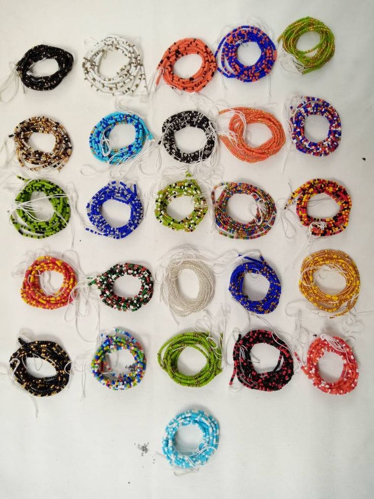 This listing consists a variety of 26 beautifully made tie on waist beads to compliment your look and give you the confidence to flaunt your body and waistline.  Choose your favorite color(s) between 1-26 from the color chart.  NOTE: The price if for ONE STRAND ONLY BUY 7 STRANDS, GET 3 FREE  You can also leave us a message with your preferred colors and we shall customize them for you.  Our items are shipped within 3-5 business days via DHL Express to ensure safety and careful handling.  Try Mi Festival Beaded Necklace With Round Beads, Beach Beaded Bracelets With Polished Beads, Festival Beaded Bracelets With Polished Oval Beads, Festival Beaded Bracelet With Polished Oval Beads, Polished Oval Beads Bracelets For Beach, Adjustable Round Beaded Chain, Oval Polished Beaded Bracelets For Beach, Polished Round Beads For Festivals, Adjustable Multicolor Beaded Craft Supplies