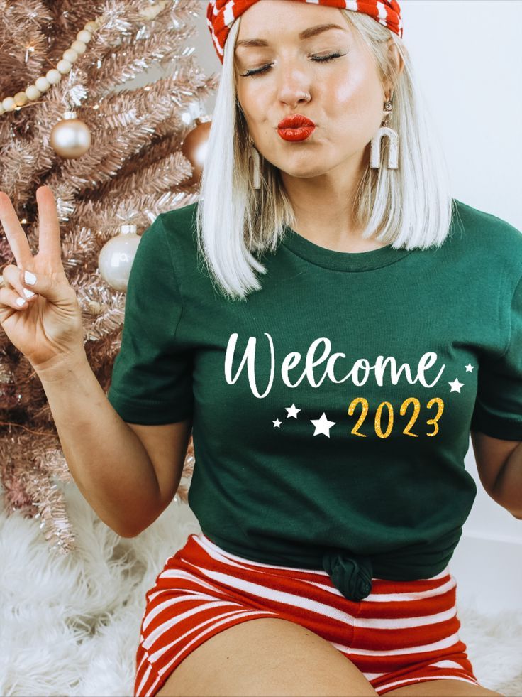 Welcome 2023 shirt New Years Eve shirt New Years shirts Happy New Year shirt, New Years Eve party outfit Family holiday apparel cruise shirt New Years Party Outfit, New Years Eve Party Outfits, Happy New Year Shirt, New Years Eve Shirt, New Year Shirt, Trendy Christmas Outfits, T Shirt Crop Top, New Years Shirts, Merry Christmas Shirts