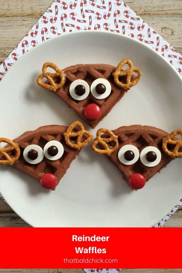 three slices of reindeer waffles on a plate with pretzels in the shape of eyes