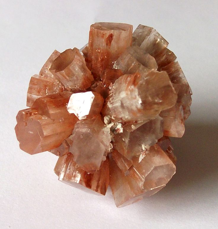 a cluster of crystals sitting on top of a white table