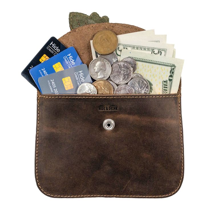 a wallet filled with money and coins