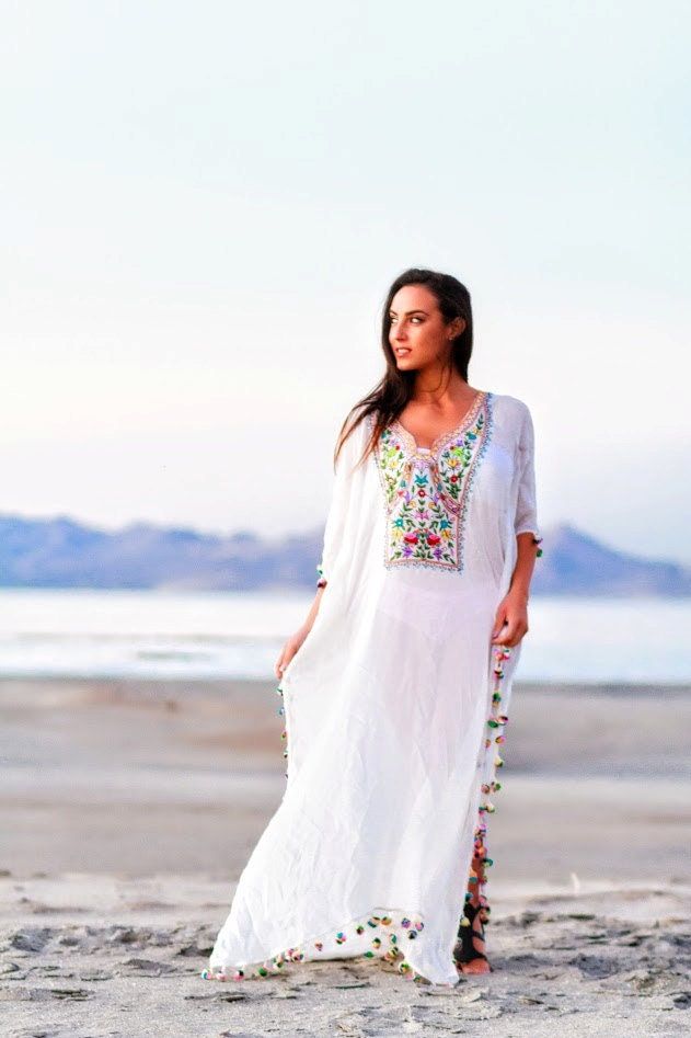 "Boho Wedding Dress, Kaftan Dress, White Maxi Dress Introducing our new range of pristine whites - vagabond p:s - This dress from BaublesNBloom was recently on the runway at Paris fashion week ! Collection AW19 Evoke a wanderlust vibe with our free spirited, beachy bohemian range which has a way of making every woman feel beautiful, and exotic. We wanted to design something elegant yet comfortable for any occassion. These embroidered kaftans inspired by an ancient folk art of India, feature trib Long White Maxi Dress, Long Kaftan Dress, Beach White Dress, Wedding Dresses Hippie, White Lace Wedding Dress, Dress Kaftan, Hippie Wedding, Boho Trends, White Boho Dress