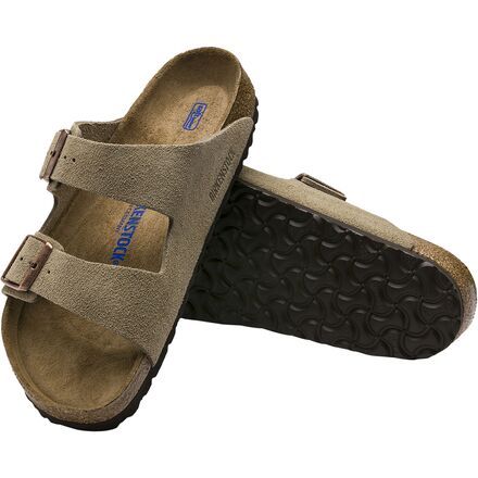 You don't have to be a long-haired hippie in order to don the Birkenstock Arizona Men's Soft Footbed Suede Sandals. Designed for pure comfort, the Arizona sandal features a soft, springy footbed that's not only a shade more lightweight than its non-soft footbed siblings but also features more cushion underfoot. Meanwhile, the molded arch support and EVA ensures day-long support, so you're able to wear the Arizona as you navigate grocery stores, concert venues, and casual Fridays at work alike. Casual Vacation Slippers With Leather Footbed, Casual Leather Footbed Slippers For Vacation, Casual Outdoor Footbed Sandals With Textured Footbed, Casual Slides With Leather Footbed, Casual Slippers With Leather Footbed, Casual Adjustable Slides With Leather Footbed, Casual Adjustable Footbed Sandals For Outdoor, Adjustable Casual Outdoor Footbed Sandals, Adjustable Casual Footbed Sandals For Outdoor