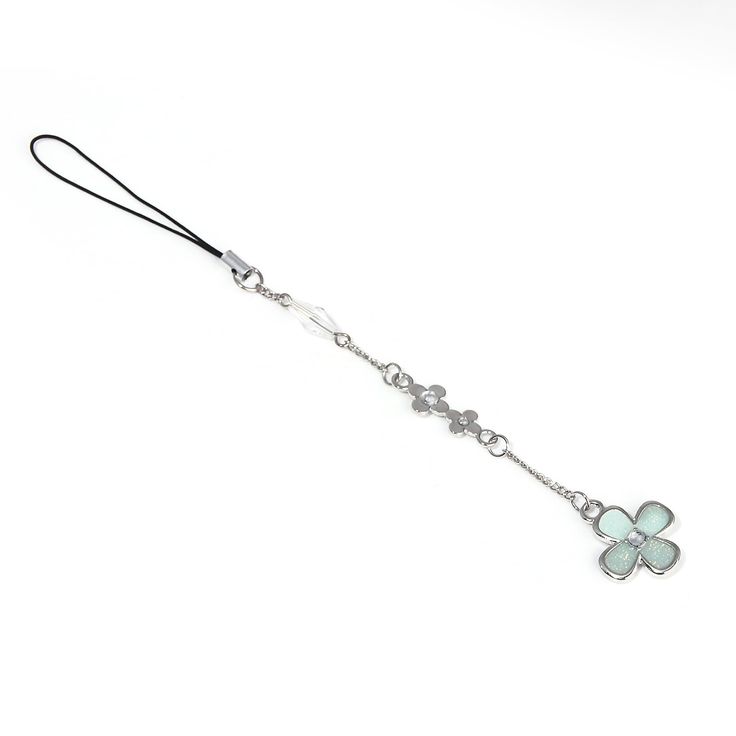 a necklace with a clover charm on it