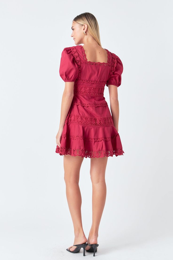 Our Lace Fit-and-Flare Mini Dress is the perfect versatile piece to add to your wardrobe. Wear it during the summer with sandals or pair it with heels and a coat for a winter holiday party. The fit-and-flare silhouette is extremely flattering and highlights your waistline, while the lace details add a feminine touch. And we made sure to add your favorite: pockets! Fit-and-flare silhouette Square neckline Lace trim detailing throughout Puffy short sleeves with elastic hems Concealed side zipper O Date Night Dress With Ruffle Hem And Square Neck, Flattering Square Neck Summer Dress, Square Neck Dress With Ruffle Hem For Date Night, Square Neck Ruffle Hem Dress For Date Night, Elegant Summer Dress With Flared Hem, Chic Midi Dress With Flared Hem For Evening, Flirty A-line Midi Dress For Brunch, Fitted Mini Dress With Flared Hem For Summer, Spring Fit And Flare Midi Dress For Night Out