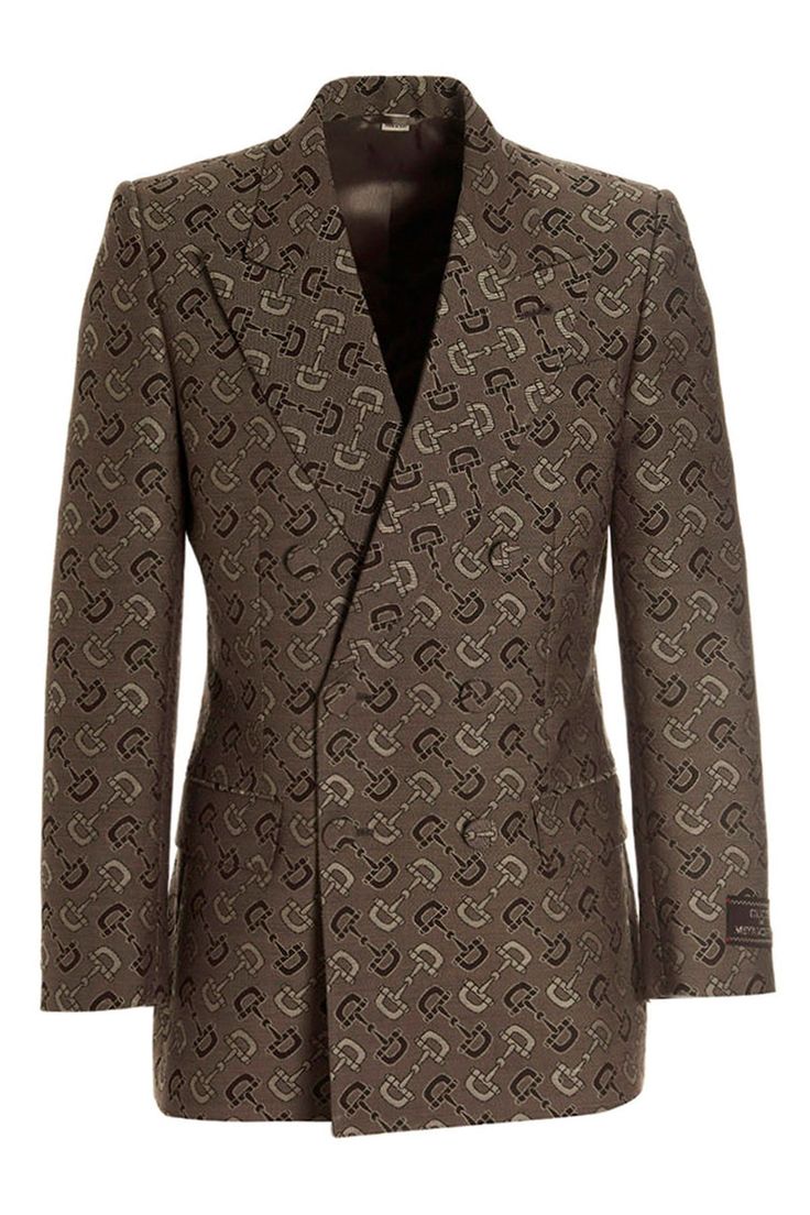 Wool and cotton blazer jacket with beige and brown 'Maxi' horsebit pattern, with double breast style with button closure, "Gucci 1921 Metadatamorphii", peak lapels and pleated shoulders. Color: Brown Size & Fit: True to size fit Composition: 70% cotton 30% wool Made in: Italy SKU: 705284ZAKIV9549 Our Products Are 100% Genuine. In All Cases We Stand By The Authenticity Of Every Product Sold On Our Site. Gucci Double-breasted Office Outerwear, Gucci Double-breasted Outerwear For Office, Classic Gucci Double-breasted Blazer, Gucci Double-breasted Outerwear For Business, Gucci Elegant Blazer With Double Button Closure, Tailored Gucci Blazer With Double Button Closure, Gucci Fitted Double Button Blazer, Tailored Gucci Blazer With Buttons, Elegant Gucci Double-breasted Outerwear