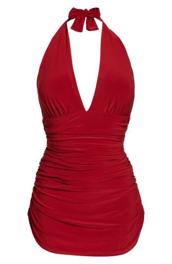 Appear slimmer and sleeker in second in Magicsuit’s fashionable body-control swimwear designed for the modern woman. Channel retro glamour in a plunging one-piece swimsuit fashioned from slimming fabric and shirred at the torso to further flatter your figure. 69% nylon, 31% Lycra® spandex with 95% polyester, 5% spandex contrast Hand wash, line dry Imported Elegant V-neck Swimwear For Pool, V-neck Ruched Tankini, Solid V-neck Ruched Tankini, Solid Ruched V-neck Tankini, Solid V-neck Ruched Swimwear, Solid Color Ruched V-neck Swimwear, Chic Fitted One-piece Swimwear, Elegant V-neck Tankini With Lined Body, Fitted V-neck Swimwear For Pool