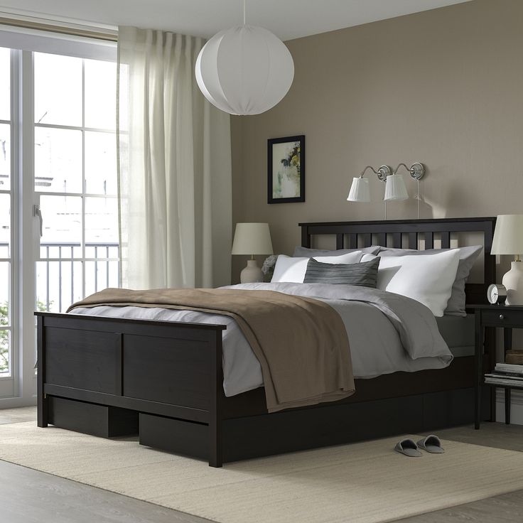 HEMNES bed frame with 4 storage boxes, black-brown/Lyngör dark gray, Full. A timeless beauty in solid wood that becomes the centerpiece of your bedroom. In the storage drawers under the bed you can put bedding, extra pillows, a warming blanket or anything else you want close by. Leg/ Headboard/ Bedside/ Top rail/ Middle rail: Solid pine. Bedroom Black Bed Frame, Black Wood Bed Frame, Warming Blanket, Ikea Hemnes Bed, Black Beds, Hemnes Bed, Bed Frame Legs, Headboard Bedroom, Black Bed Frame