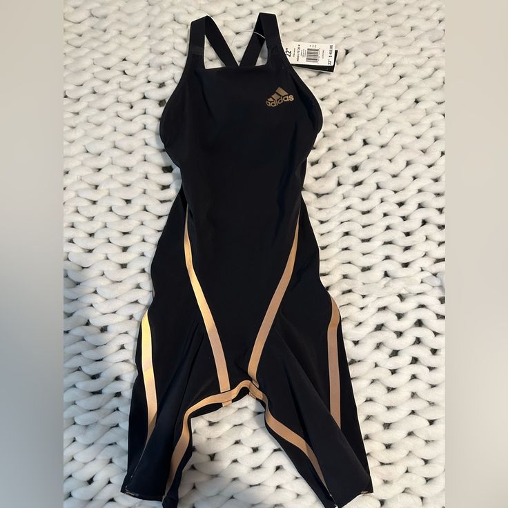 Adidas Swimwear Adizero 22” Black And Gold Metal Adidas Natacin Adizero 22” Negro Y Dorado Metlico Fina Av Approved 2020 Performance Swimsuit Strategically Placed Core-Positioning Tape Gripper Tape At Hem Size: 22” (2xs) Brand: Adidas Adizero Swim New With Tags Material: Main Material 74% Nylon 26% Spandex (Elastane) Lining 66% Nylon 34% Spandex Black Sporty Swimming Activewear, Black Stretch Dynamic Activewear, Black Dynamic Stretch Activewear, Black Compressive Functional Swimwear, Dynamic Black Stretch Activewear, Black Breathable Athleisure Swimwear, Black Breathable Sportswear Swimwear, Functional Black Activewear For Swimming, Fitted Breathable Swimwear For Sports