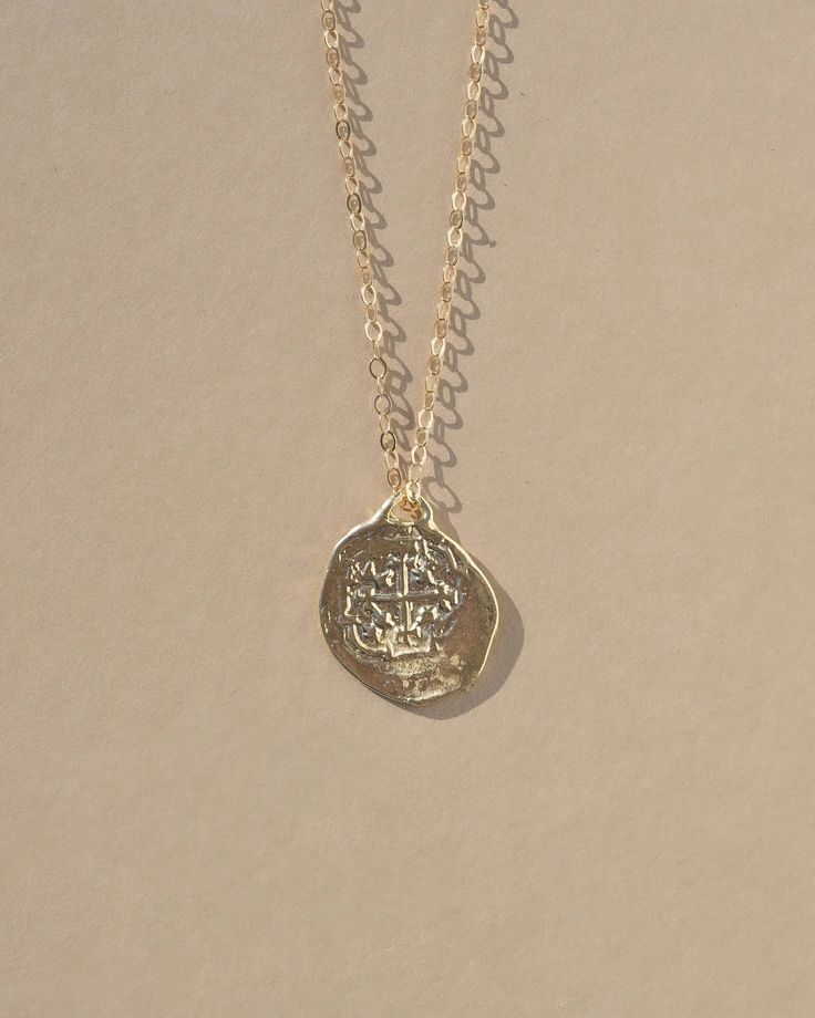 Reversible double sided Medallion charm necklace made from an old Spanish coin. A gorgeous and detailed gold necklace perfect for any occasion. Cast from an original ancient coin, the Medallion Necklace was designed to attract growth, fortune, and opportunity. Coins have a long history of bringing good luck and have be Cheap Coin Necklace With Medallion Pendant, Cheap Medallion Necklace With Coin Pendant, Cheap Medallion Coin Necklace As Gift, Cheap Medallion Coin Necklace Gift, Cheap Women's Medallion Necklace With Coin Pendant, Cheap Round Medallion Necklace With Coin Pendant, Cheap Classic Necklace With Coin Pendant, Luxury Coin-shaped Amulet Medallion Necklace, Cheap Silver Medallion Necklace