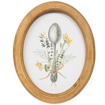 a wooden frame with a spoon and flowers painted on the front in white, yellow and green