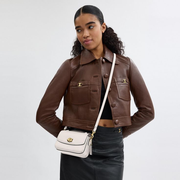 Our structured Cassie crossbody has classic good looks and ample room to hold everyday essentials with three organized compartments. A more compact version of the original the 17 is crafted of refined pebble leather and finished with our iconic turnlock closure. Style the versatile bag three ways: carry by hand with the ladylike top handle wear on the shoulder with the elegant chain strap or crossbody with the adjustable leather strap. | Coach Cassie Crossbody Bag 17 - Women's Designer Crossbody Coach Top Handle Bag, Classic Shoulder Bag With Cc Turnlock And Double Flap, Classic Double Flap Shoulder Bag With Cc Turnlock Closure, Elegant Flap Bag With Cc Turnlock For Everyday Use, Elegant Flap Bag With Cc Turnlock Closure, Classic Flap Bag With Cc Turnlock Closure, Classic Business Flap Bag With Cc Turnlock Closure, Everyday Double Flap Shoulder Bag With Cc Turnlock, Timeless Flap Bag Satchel With Cc Turnlock Closure