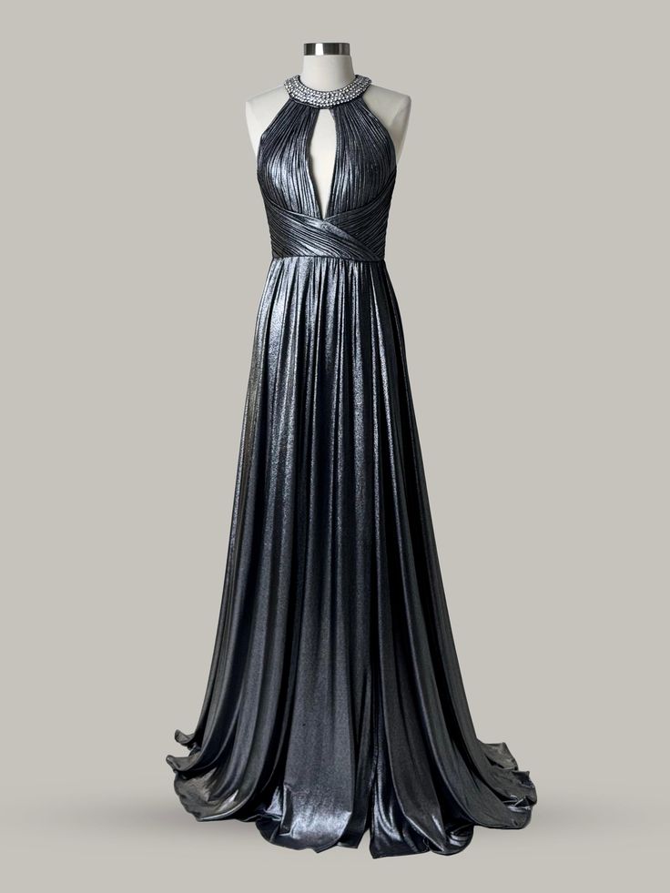 Illuminate your evening with this breathtaking Jovani Evening Maxi Dress, crafted in a stunning metallic color that shines from every angle. Ideal for formal events where you want to make a memorable entrance, this dress combines elegance with a touch of glamour. Available in size 4 and brand new without tags, this exquisite piece was originally priced at $590. Take advantage of this exceptional offer and ensure your presence is unforgettable at your next social event. Shipping is available to both the US and Canada, making it easier to add this dazzling gown to your collection. Condition: Brand New without Tags Designer Brand: Jovani General Category: Evening Dress Size: 4 Dress Style: Maxi Dress Fitted Shimmer Gown For Evening, Glamorous Evening Maxi Dress With Shimmer, Elegant Evening Gown With Shimmer, Fitted Shimmer Maxi Dress For Evening, Elegant Shimmer Evening Dress, Shimmer Evening Dress For Gala During Prom Season, Floor-length Shimmer Evening Dress For Gala, Shimmer Floor-length Maxi Dress For Gala, Floor-length Shimmer Maxi Dress For Gala