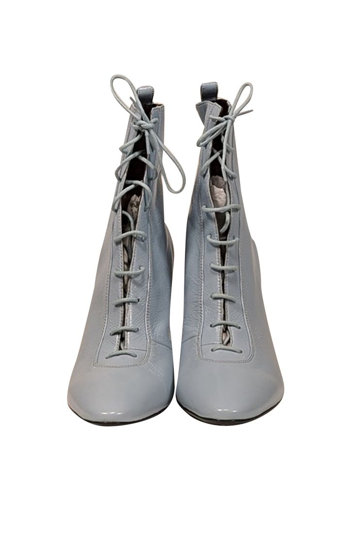 Slip into these playful Marc Jacobs boots and step up your spring fashion game. The baby blue leather and Victorian lace-up style will add a unique touch to any outfit. Pair with a floral puff sleeve dress and a chic bow for the ultimate transition look! Size 10 (IT 40) Leather upper, lining, and sole Lace up front tie Round toe Comes with a dust bag Heel height 3.5" Spring High-top Lace-up Boots, Trendy Spring Lace-up Boots, Casual Lace-up Heeled Boots For Spring, Trendy High-top Lace-up Boots For Spring, Spring Lace-up Heeled Boots With Reinforced Heel, Trendy Lace-up Boots For Spring, High Ankle Lace-up Boots For Spring, Trendy Spring Lace-up Boots With Reinforced Heel, Spring Reinforced Heel Lace-up Boots