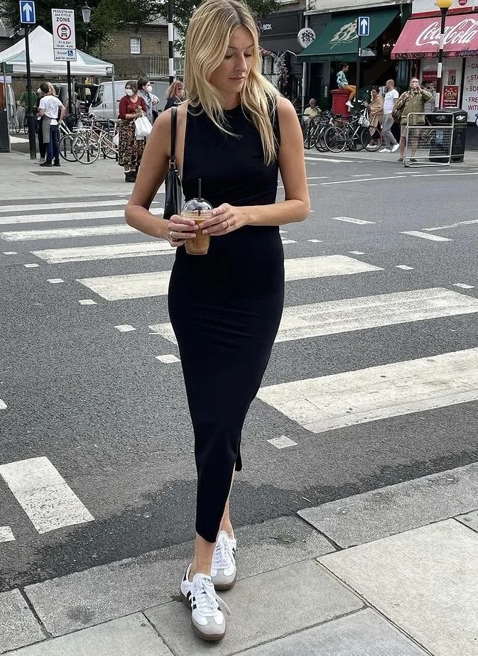 The Best Parisian Summer Outfits From The Streets Of Paris | Le Chic Street Midi Dress Sneakers, Parisian Summer Outfits, Black Midi Dress Outfit, Paris Fashion Summer, Paris Summer Outfits, Parisian Wardrobe, Looks Adidas, Parisian Outfit, Camille Charriere