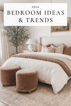 a bed room with a neatly made bed and two stools in front of it