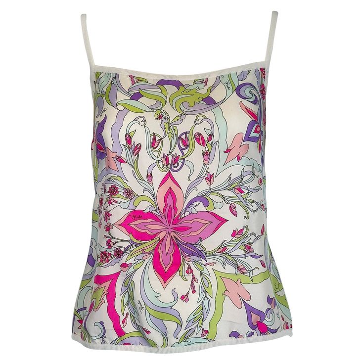 Emilio Pucci silk print camisole top. Beautiful silk print in white, lavender, pink, pale blue, pale green & purple at the front. The back & straps are knit rayon in white. Marked size 8, the back has a bit of stretch. In excellent wearable condition. All our clothing is dry cleaned and inspected for condition and is ready to wear. Any condition issues will be noted. For visual comparison our mannequin is a size 4. Please check the measurements provided below and compare with your own measurements for the best possible fit! Please contact us if you have any questions about this item or need more photos. Measurements are in inches: Bust 32 Hem 34 Shoulder strap top to hem back 20 Chic Closet, White Lavender, Lavender Pink, Shell Tops, Sleeveless Tops, Christian Lacroix, Strap Top, Harper's Bazaar, Strap Tops