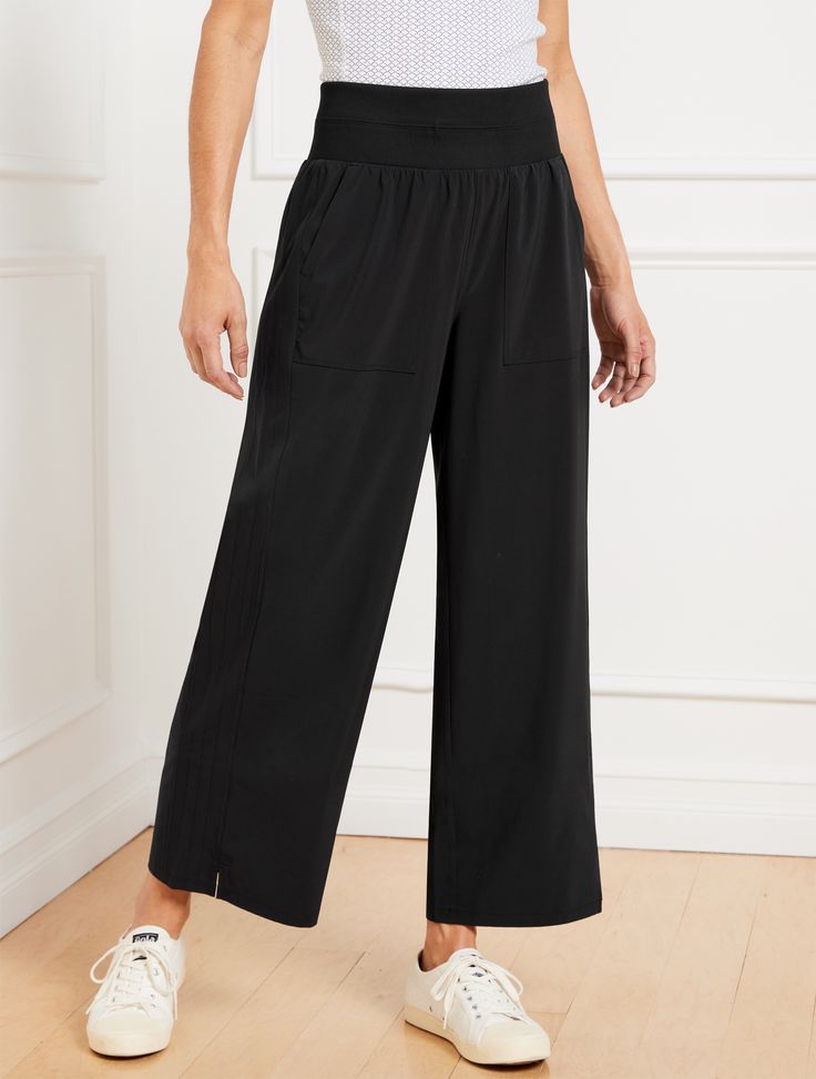 Part of T by Talbots, our most comfortable collection ever! Leisurely, light and ready for your everyday adventures. Elevate your sporty-chic look with these utility-inspired wide leg pants. Features a flattering high waist and side slits at the hem. Lightweight Woven Stretch fabric provides incredible all-day comfort and style. Packable, wrinkle-resistant finish with SunWell UPF 50+ protection. Detailed with patch pockets for all your essentials. Features Wide Leg Hits Above Waist Ankle Length Pull On Closure Front Patch, Back Welt Pockets Side Slit Hem SunWell UPF 50+ Imported Fit: Misses: 27"; Petite: 24 1/2"; Plus: 27"; Plus Petite: 24 1/2" Material: 86% Polyester, 14% Spandex Care: Machine Wash Cold; Only Non-Chlorine Bleach When Needed; Tumble Dry Low; Cool Iron, If Needed | Lightwei Versatile Ankle-length Wide Leg Pants, Athleisure Wide-leg Parachute Pants With Pockets, Wide Leg Activewear With Pockets And 4-way Stretch, Versatile Straight Leg Yoga Pants With Pockets, Athleisure Wide Leg Pants With Elastic Waistband, Sporty Parachute Pants With Elastic Waistband For Work, Versatile Wide-leg Parachute Pants For Workwear, Athleisure Wide Leg Pants With Pockets, Sporty Wide-leg Cargo Bottoms