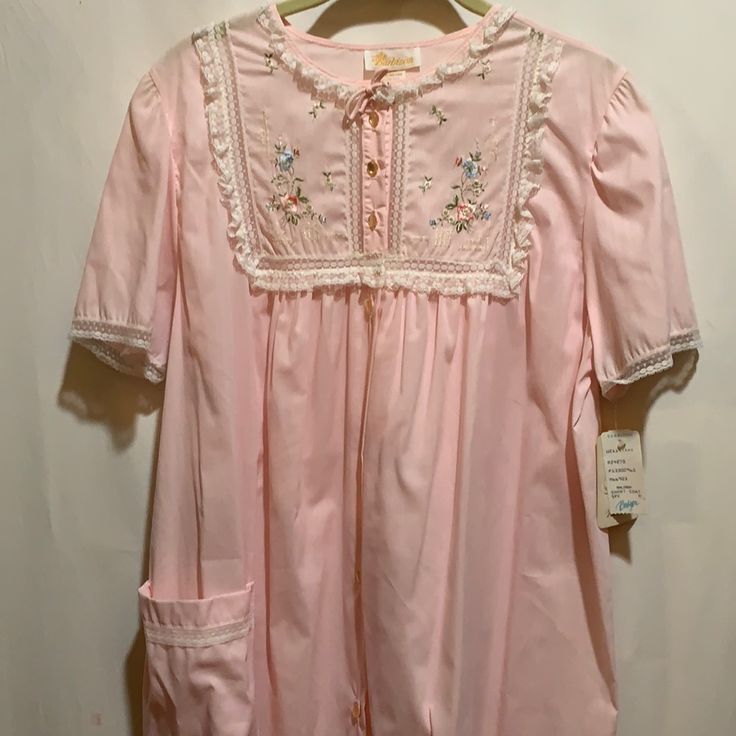 Nwts Deadstock Vintage Barbizon Pale Pink Robe With Embroidered Bodice Inset::Sz M ::Lace Trim Button Front::44.% Poly 33% Nylon 24% Cotton::(Pp 23” L42” ) Measurements Are Approximatefabulous Condition..Never Worn Spring Fitted Sleepwear, Fitted Spring Sleepwear For Bedtime, Fitted Sleepwear For Summer, Fitted Sleepwear For Bedtime In Spring, Feminine Fitted Bedtime Tops, Fitted Spring Sleepwear For Home, Fitted Sleepwear For Spring Sleepover, Feminine Fitted Cotton Nightgown, Fitted Feminine Cotton Nightgown