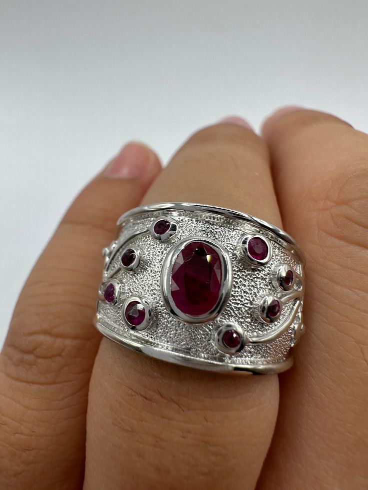 Unusual  Deep Toned Ruby finished 925 Sterling Filigree Setting Handmade  size 7.25  Can be resized. My jeweler charges $20 All rings are shipped in a nice gift box.   Check out our over a THOUSAND great reviews Engraving is $4 per letter and is not always perfect depending on the piece. It can take a few days if the jeweler is busy. This is payable to Paypal Judithsltd@gmail.com Oval Wide Band Sterling Silver Ring Gift, Elegant Wide Band Ring Stamped 925 As Gift, Unique Silver Ruby Ring With Polished Finish, Unique White Gold Wide Band Ring For Anniversary, Unique Wide Band Jewelry For Anniversary, Collectible Oval Ruby Ring In Silver, Wedding Sterling Silver Wide Band Ring Stamped 925, Silver Sterling Silver Ruby Ring For Anniversary, Anniversary Sterling Silver Ruby Ring In Silver