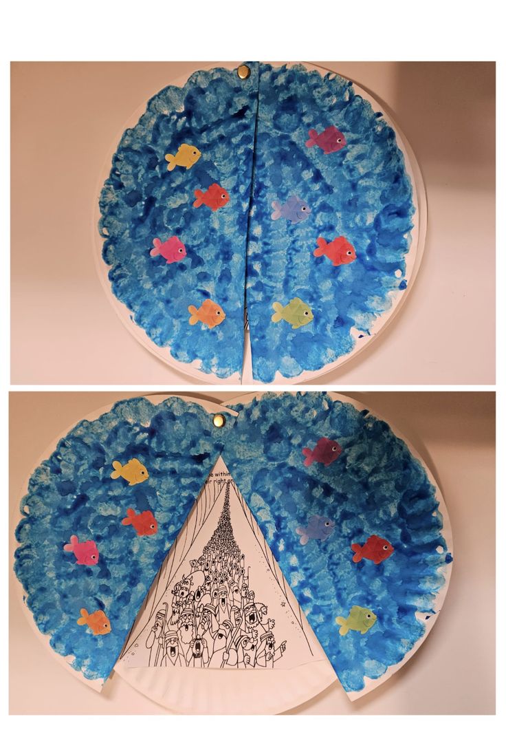 two plates with fish on them, one is made out of paper and the other has blue