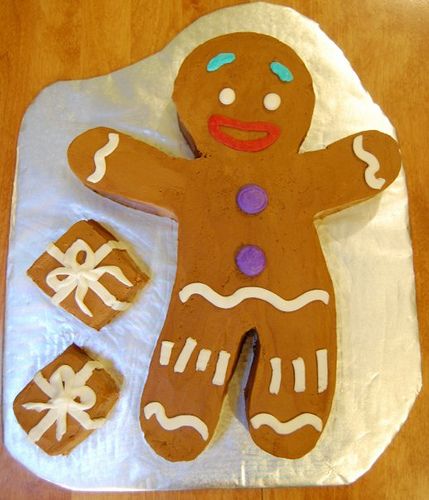 a homemade gingerbread man is sitting on the table