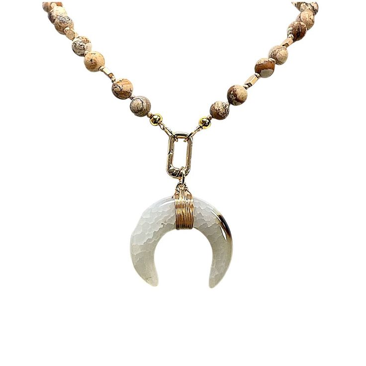 Get ready to channel your inner artist with our Picasso Frosted and Beaded Agate Crescent Necklace! With its unique frosted and beaded agate design, this necklace is both a statement piece and a work of art. Embrace your individuality and creativity with this fun and playful accessory. Long Agate Beaded Chain Necklace, Long Agate Beaded Chain Necklaces, Elegant Hand-strung Agate Necklace, Bohemian Agate Beaded Chain Necklace, Agate Pendant Beaded Necklaces, Beaded Agate Pendant Necklace, Agate Beaded Chain Necklace With Round Beads, Spiritual Agate Beaded Necklace, Beaded Agate Pendant Crystal Necklaces