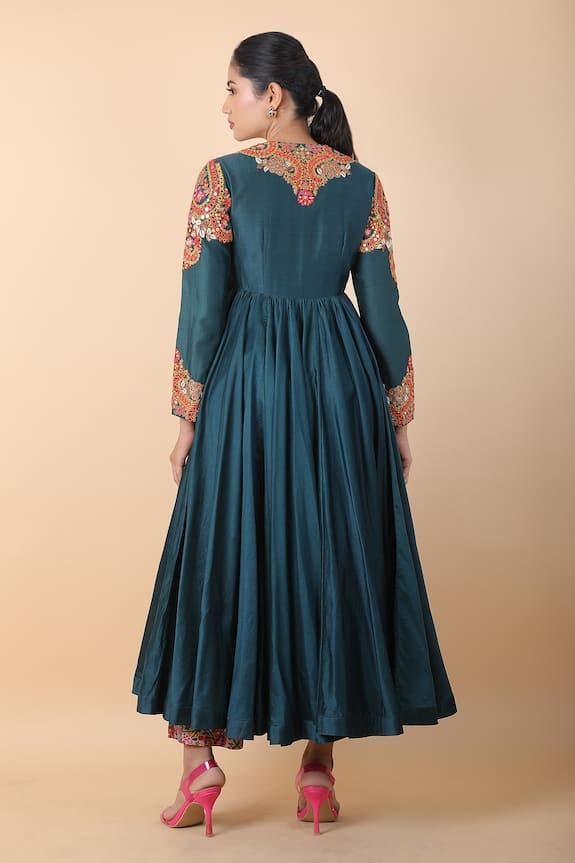 Blue asymmetric hem kalidar kurta with multi colored floral embroidery and mirror work highlights. Comes with floral printed pant. - Aza Fashions Anarkali Salwar Kameez With Floral Embroidery In Art Silk, Art Silk Anarkali Set With Floral Embroidery, Anarkali Kurta With Floral Embroidery In Art Silk, Floral Embroidered Anarkali Kurta In Art Silk, Blue Anarkali Set With Intricate Embroidery, Floral Embroidered Anarkali Set For Reception And Navratri, Chanderi Maxi Kurta With Intricate Embroidery, Transitional Anarkali Kurta With Intricate Embroidery, Anarkali Kurta With Floral Embroidery