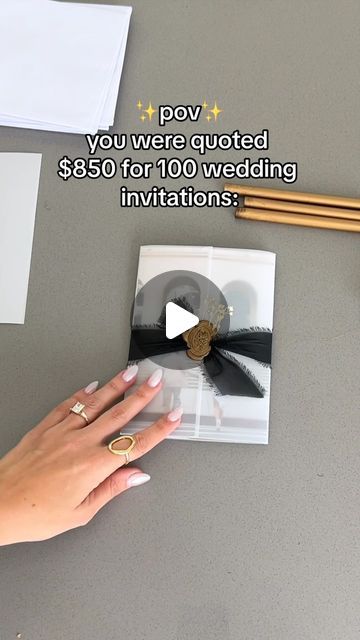 a woman's hand holding a piece of paper with the words pov you were quoted $ 8 for 10 wedding invitations