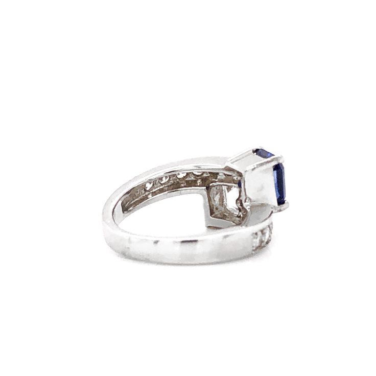 This Gemini twin inspired ring is crowned with a Ceylon blue sapphire 2.17 ct in emerald cut. It is mirrored by a white diamond 1.06 ct also in emerald cut, in G-H Color Clarity VS. Both pair of stones are GIA certified. Smaller round natural white diamonds 0.65 ct as accents. Platinum 950 metal. Length: 1.1 cm Width: 1.0 cm Weight: 7.1 g [shortcode] [video] [/video] [/shortcode] Diamond Chandelier, White Gold Hoop Earrings, Platinum Bracelet, Ceylon Blue Sapphire, White Gold Hoops, Platinum Earrings, Platinum Diamond Rings, Ceylon Sapphire, 18k Gold Jewelry