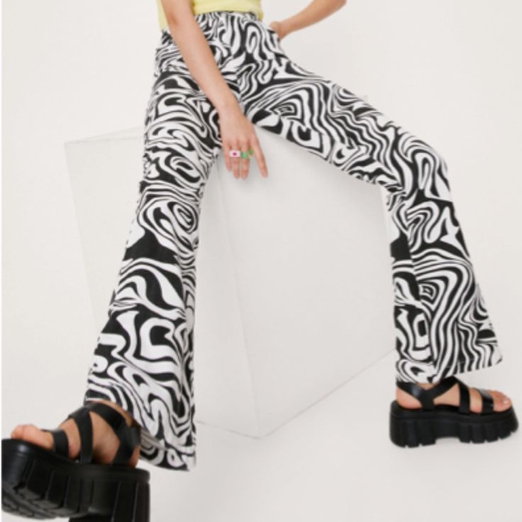 Marble Print Denim New White Stretch Y2k Bottoms, Retro Black Pants For Spring, Black Retro Spring Pants, Retro Black Spring Pants, Black Graphic Print Jeans For Spring, Retro Black Bottoms For Spring, Edgy White Denim Bottoms, Spring Graphic Print Black Jeans, White Y2k Jeans For Summer