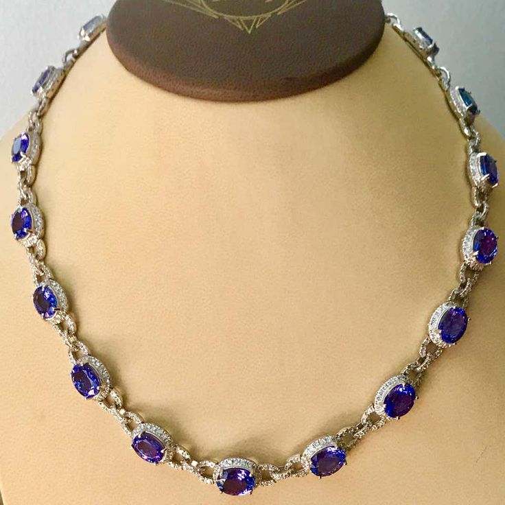 For Sale on 1stdibs - This extraordinary Necklace is consist of 19 Fine oval Tanzanite weighing approximately 47 Carats. There are total of approximately 8.5 carats of shimmering Oval Sapphire Diamond Necklace, Luxury Sapphire Necklace For Formal Occasions, Luxury Sapphire Round Necklace, Luxury Sapphire Round Necklaces, Luxury Blue Diamond Cut Necklace, Formal Round Diamond Necklace With Gemstones, Classic Sapphire Diamond Necklace For Formal Occasions, Formal Round Sapphire Necklaces, Classic Sapphire Necklace For Formal Occasions