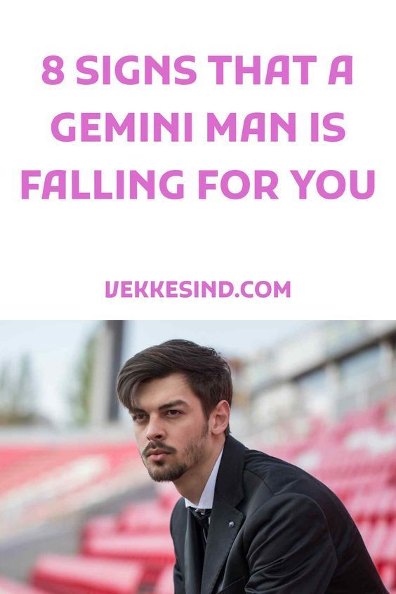 a man in a suit and tie with the words 8 signs that a genni man is falling for you