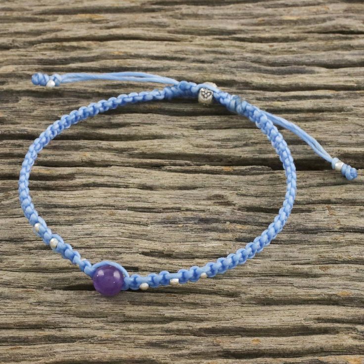 Celebrating the purity of life Thai artisan Samart Takham hand-braids blue cord strung with Karen hill tribe silver beads and a macrame-style amethyst pendant at the center. Closing with a sliding knot the bracelet features an adjustable length. Hill Tribe Silver, Macrame Bracelet, Sliding Knot, Woven Bracelets, Macrame Bracelets, Amethyst Pendant, Silver Accents, Jewelry Packaging, Jewelry Gift Box