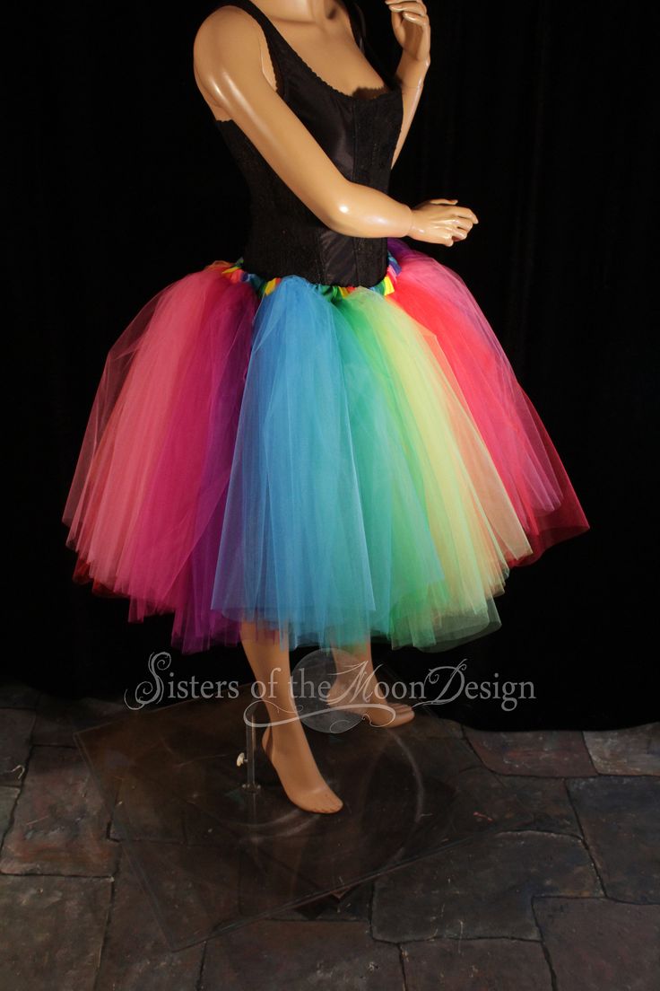 "Perfect tutu for Pride! This tulle tutu skirt Can also be used for carnivals, weddings, costumes, clowns, or anything rainbow themed! This tutu design is extra fluffy! This rainbow tutu design is Handmade from 50yards, two layers of gathered panels of soft smooth red, orange, yellow, mint, green, turquoise, purple, fuchsia and hot pink Bridal tulle. All tulle panels have been tightly machine gathered and serged to the soft rainbow fabric covered elastic waistband. This tutu is fully sewn not ti Spring Costume Party Tutu Dress With Tulle Skirt, Summer Costume Party Tulle Petticoat, Summer Tulle Petticoat For Costume Party, Stretch Tulle Tutu Dress For Costume Party, Multicolor Tulle Tutu Dress For Costume Party, Fun Fitted Tutu Dress For Party, Ballet Style Tulle Tutu Dress For Costume Party, Carnival Costume Tutu Dress In Tulle, Fitted Tutu Dress For Carnival Costume Party