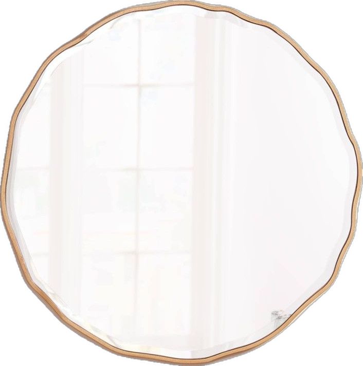 a round mirror sitting on top of a white wall