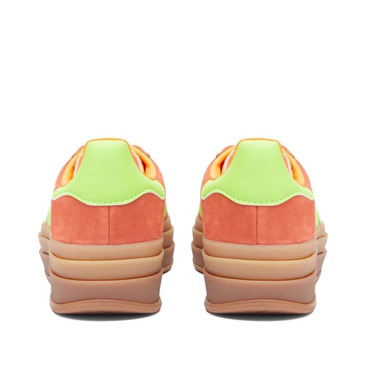 Add some boldness and stand out from the crowd with the iconic Adidas Gazelle Bold W sneakers. Perfect for capturing your unique style on Instagram, these reimagined kicks feature a striking orange suede upper contrasted by lime green accents and metallic gold branding that will elevate any outfit with signature heritage flair. With their boosted silhouette and butter-soft materials, you’ll look and feel comfortable conquering each day in iconic retro adidas style. Adidas Sporty Platform Sneakers For Streetwear, Adidas Retro Sneakers With White Sole, Adidas Retro Sneakers With Vulcanized Sole, Retro Adidas Sneakers With Rubber Waffle Outsoles, Retro Adidas Sneakers With Logo, Retro Platform Sneakers With Contrast Sole, Adidas Retro Sneakers With Gum Sole, Retro Adidas Sneakers With Gum Sole, Retro Green Adidas Sneakers