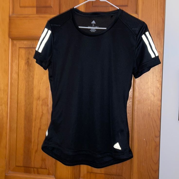 Women’s Adidas Athletic Top. Perfect For Gym Or Athleisure Wear. Mess Detailing On Shoulders And Top Of Back. Perfect Condition. Never Worn! Moisture Wicking Material. Sporty Athletic Fit T-shirt For Gym, Sporty Workout T-shirt, Adidas Sportswear T-shirt For Gym, Sporty Fitted Adidas Logo Tops, Black Athletic Fit T-shirt For Athleisure, Sporty Stretch Top With Three Stripes, Sporty T-shirt With Three Stripes For Sports, Black Athleisure T-shirt For Sports, Black Sporty T-shirt With Athletic Fit