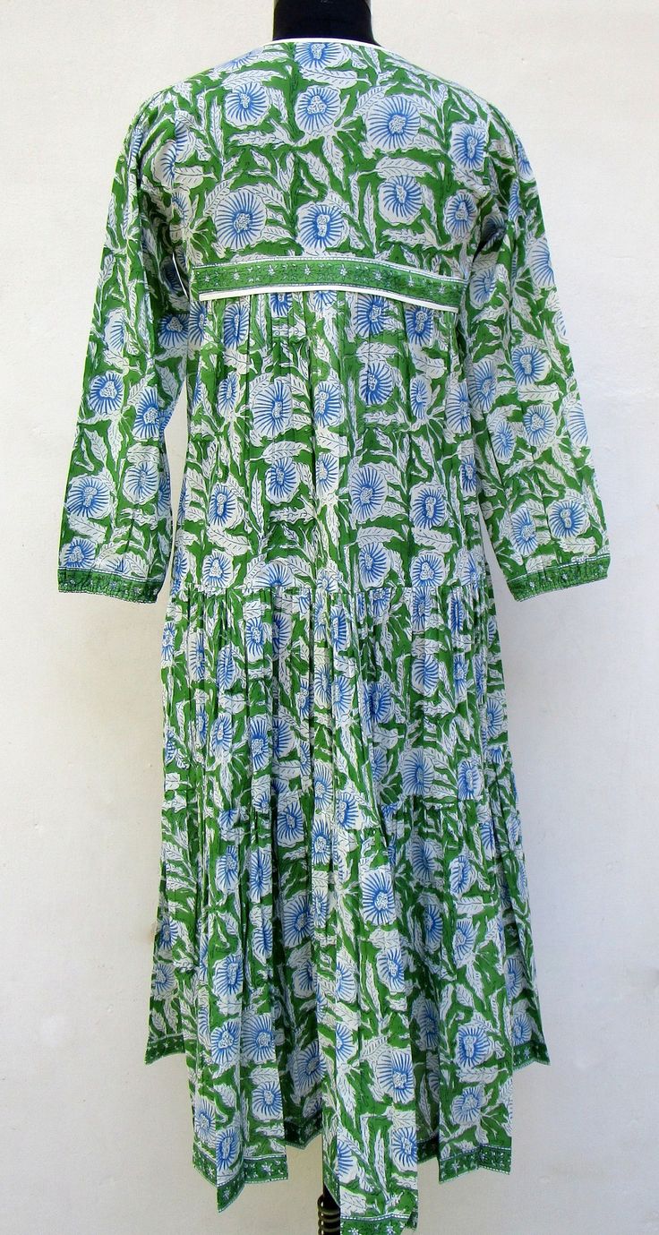 "ITEM DESCRIPTION green & blue cool floral printed maxi dress - long sleeve with tassel dress - v neckline maxi dress Features : Long sleeve, V neck, Long dress Material : 100% cotton cambric Fabric: 100% cotton soft light weight ethnic print fabrics Sleeve Length = 22 inch For more sizes & their measurement, please refer our below chart to understand the sizes variations available with us For your size requirement, please mention your size in seller note at the time of buying. SIZE MEAS Green V-neck Boho Dress For Spring, Bohemian Non-stretch Dress For Garden Party, Green Non-stretch Long Sleeve Maxi Dress, Non-stretch Green Maxi Dress, Green Maxi Dress Regular Fit, Bohemian Non-stretch Long Maxi Dress, Green Maxi Dress For Spring, Green Non-stretch Midi Dress, Green Maxi Dress For Fall