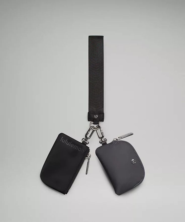 two black luggage tags attached to a lanyard