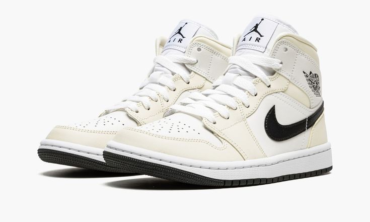 The Women’s Air Jordan 1 Mid “Coconut Milk" is a versatile colorway of Michael Jordan’s first signature shoe in the popular mid-top height for women. An everyday option, the “Coconut Milk” Jordan 1 Mid’s perforated toe, mid-panel, and collar are designed in white leather. A low-contrast shade of Coconut Milk-colored leather is found on the toe cap, forefoot, eyelets, collar, and heel. Both the leather Swoosh on the sides and the “Wings” logo on the collar appear in black leather. A black Jumpman Cosy Winter Outfits, Womens Air Jordan 1, Womens Air Jordan, Nike Air Jordan 1 Mid, Womens Air Jordans, Shoe Inspo, Cute Nikes, Swag Shoes, Air Jordan 1 Mid