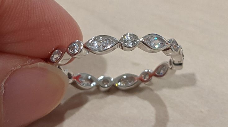 Australian seller stock 925 sterling silver Bezel marquise and round cubic zirconia all around - can't resize Stackable ring/band Sizes from 3.75 us to 12.75 us  That's from size G UK/aus to Z+1 UK/aus Weight from 2-2.3 grams VERY STRONG AND STURDY Will sent as registered mail from Australia post Sizes  3.75 us = G UK/aus 4.75 us = J UK/aus 5.75 us = L UK/aus 6.75 us = N UK/aus 7.75 us = P UK/aus 8.75 us = R UK/aus 9.75 us = T UK/aus 10.75 us = V UK/aus 11.75 us = X 1/2 UK/aus 12.75 us = Z+1 UK/aus Stackable Oval Diamond Jewelry, Fine Jewelry Marquise Cut Cubic Zirconia Stackable Rings, Stackable Lab Grown Diamond Jewelry For Wedding, Stackable Lab-grown Diamond Jewelry For Wedding, Marquise Cubic Zirconia Stackable Rings For Anniversary, Diamond White Stackable Ring Jewelry, Marquise Eternity Band With Diamond-cut Cubic Zirconia, Diamond White Marquise Cut Stackable Rings For Anniversary, Marquise Cubic Zirconia Eternity Band With Brilliant Cut