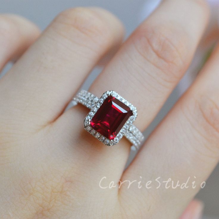 Emerald Cut Lab Ruby ring, material 925 sterling silver, plated with white gold, beautiful as promise ring. Main Stone: Lab Created Ruby Cut: Emerald Dimension: 7*9 mm Side Stone: CZ CS0362 Processing time 12-18 days, ship by express shipping when it's ready, if have custom request please contact. Ruby Ring With Radiant Cut Center Stone For Gift, Square Cut Ruby Jewelry Fine Jewelry, Fine Jewelry Ruby Ring With Radiant Cut, Gift Ruby Ring Radiant Cut Fine Jewelry, Fine Jewelry Gift Ruby Ring With Radiant Cut, Gift Radiant Cut Ruby Ring With Prong Setting, Emerald Cut Ruby Ring With Diamond Details, Red Cubic Zirconia Jewelry In Baguette Cut, Red Cubic Zirconia Jewelry Baguette Cut