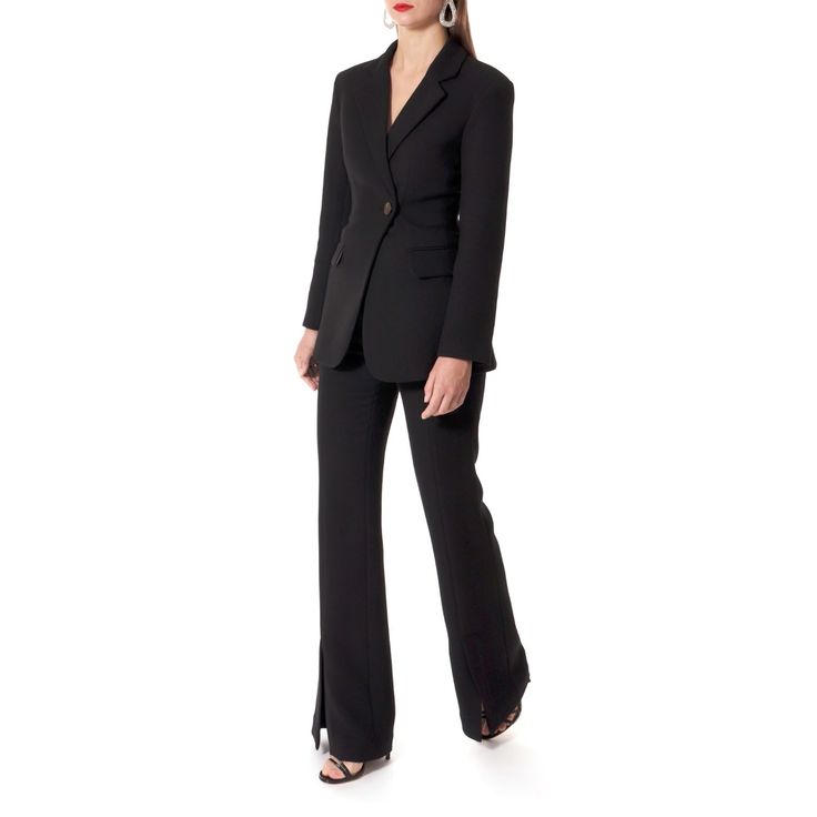 The jacket is made of fleshy, slightly thicker twill with a visible structure of the weave. The gentle line of the shoulders slightly protruding beyond the figure and the lower lapels drawing the feminine hip line. The waist is very much accentuated by the fit and the folds of the material formed after fastening, which strongly marks the hourglass line. Will make a perfect match with MONICA DESIGNER BLACK Pants. Wear also with tight trousers and heels or a midi skirt and high boots.Due to the th Chic Evening Outerwear With Pressed Crease, Evening Structured Outerwear With Notch Lapel, Timeless Structured Evening Outerwear, Chic Structured Suits For Winter, Chic Structured Winter Suits, Modern Fitted Long Sleeve Pantsuit, Modern Fitted Pantsuit With Long Sleeves, Chic Pantsuit With Structured Boning For Fall, Timeless Structured Evening Blazer