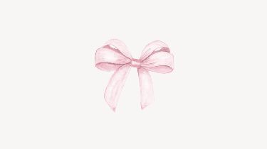 a pink bow on top of a white wall with the word love written below it