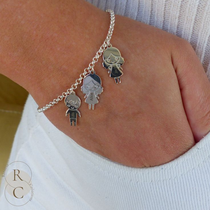 This family bracelet is a must have for all mums. It is personalized with the name or initial of each child engraved on a girl or boy charm. The mom's bracelet with kids charms is a perfect gift for Valentine's Day, Mother's Day and other beautiful occasions. ADDITIONAL DETAILS MATERIALS: Both the charms and chain are made using sterling silver 925. If you choose the gold plated option it will be  made on a base of sterling silver 925 and plated with 1 micron of 24k gold. Because the base of the Customized Sterling Silver Jewelry For Friendship, Engraved Silver Jewelry For Friendship, Sterling Silver Name Bracelet For Friendship, Silver Engraved Chain Bracelet For Friendship, Silver Engraved Bracelet For Friendship, Personalized Sterling Silver Chain Bracelet For Friendship, White Gold Sterling Silver Name Bracelet With Engraving, Engraved Silver Bracelets For Mother's Day, Personalized Bracelets As Gift For Mom