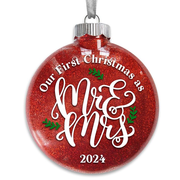 a red ornament with the words our first christmas as mr and mrs on it