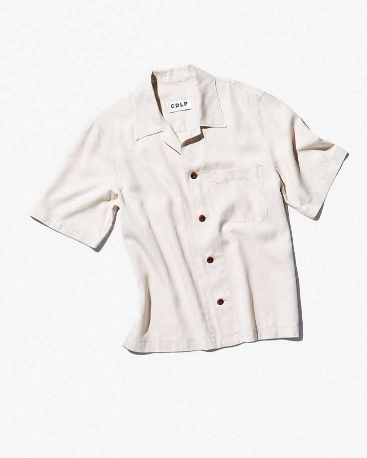 Our garment dyed, twill-weave Pool Shirt is designed with a relaxed and boxy fit, straight hem, and camp collar. Made of Tencel™ lyocell—fibres derived from certified renewable wood sources—providing breathability and a rich drape.    Relaxed, boxy fit   Camp collar   Straight hem   Four-button front closure   Chest patch pocket   Fits true to size   Style ID: MSW013112101-1500    100% Tencel™ lyocell  Made in Portugal Solid Relaxed Fit Shirt With Camp Collar, Solid Shirt With Relaxed Fit And Camp Collar, Everyday Relaxed Fit Button-up Camp Shirt, Unstructured Everyday Shirt With Camp Collar, Everyday Unstructured Collared Camp Shirt, Unstructured Camp Collar Shirt For Everyday, Unstructured Collared Camp Shirt For Everyday, Classic Camp Shirt With Camp Collar For Casual Gatherings, Classic Camp Shirt For Casual Gatherings