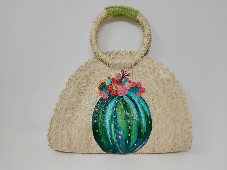 I love Mexico celebrates the native crafts of Mexico and the artists that produce them, enabling them and their communities to get recognized for their talented work and achieve economic stability for their families. This listing is for this bag shown on the picture, made of palm leaves and 100% natural materials. The tassels or other accessories on the picture are not included. The cactus paint is 100% made by hand. Measurements : please see pictures for exact size. All size units are in inches Summer Tropical Bag In Natural Color, Bohemian Summer Straw Tote Bag, Handmade Straw Bag For Spring Beach, Bohemian Bucket Beach Bag, Beachy Handmade Natural Shoulder Bag, Natural Color Tropical Style Summer Bag, Summer Straw Bag With Braided Handles As Gift, Summer Straw Bag Perfect As A Gift, Summer Gift Straw Bag With Braided Handles